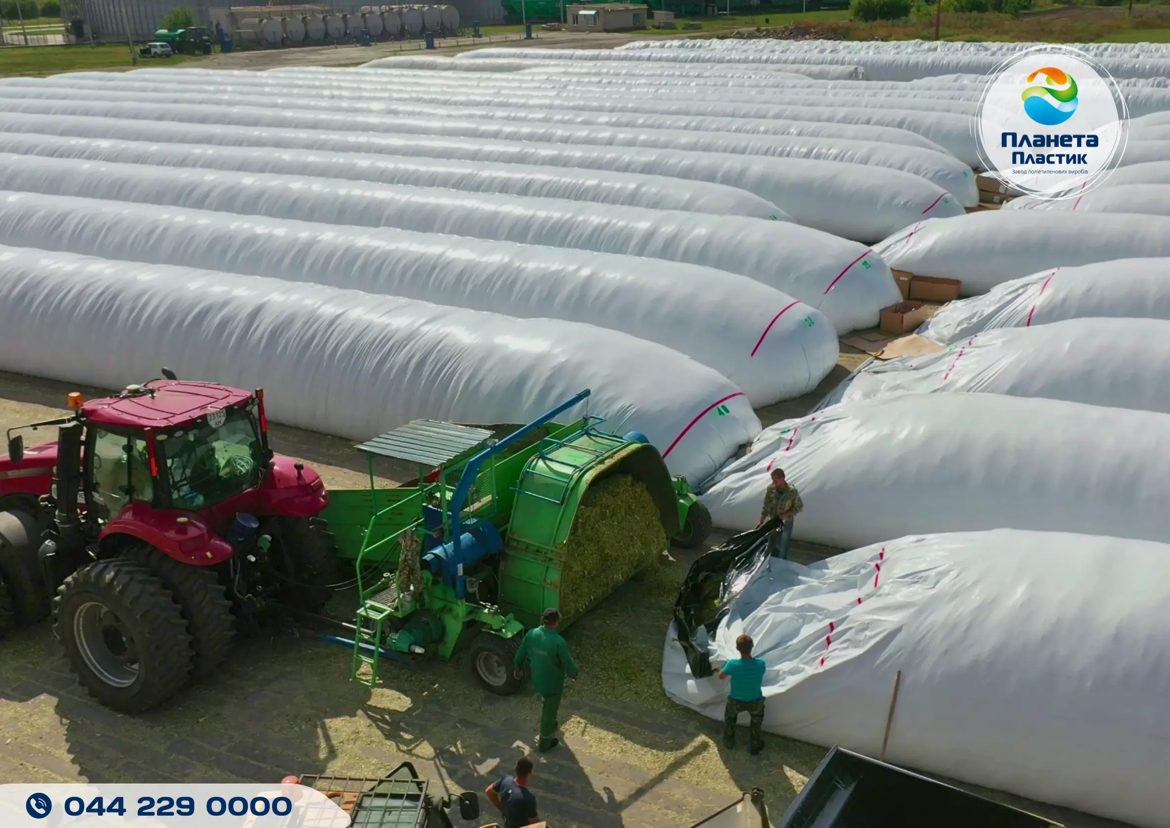 Silage and haylage loading process into a Harwell polymer bag using a silage press